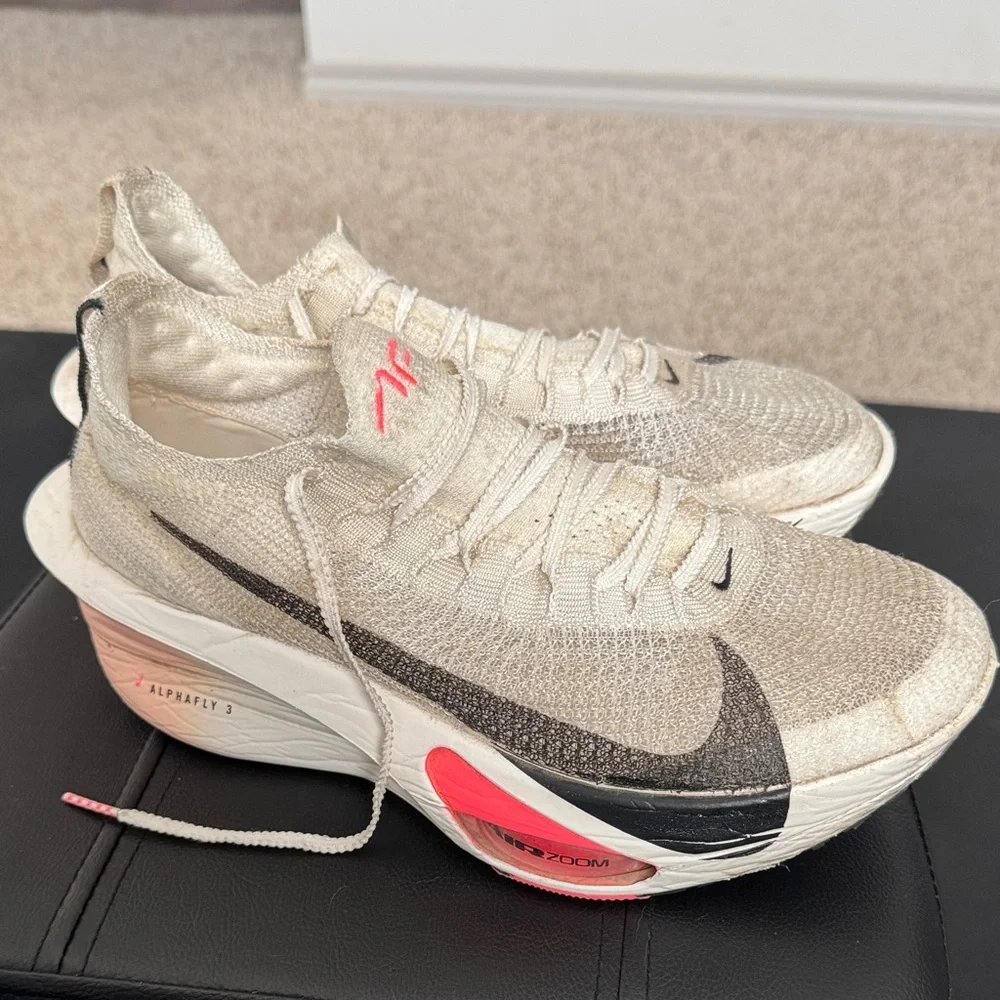 Nike Cream‎ and Black Women's Running Shoes with Pink Accents